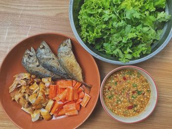 High angle view of fish in bowl on table