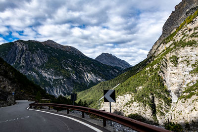 Scenic view of mountain road against sky