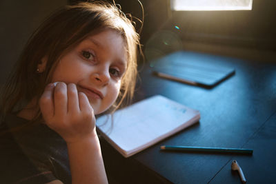 Portrait of cute girl at home