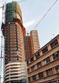 Low angle view of modern buildings against sky
