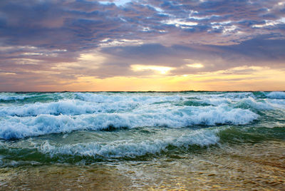 Scenic view of sea against sky during sunset