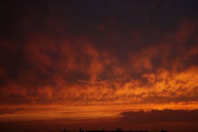 Scenic view of dramatic sky during sunset