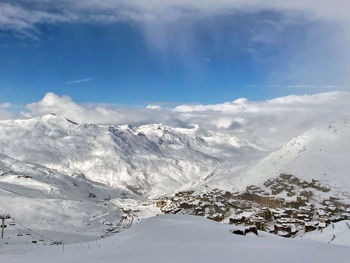 View from top of mountain to ski resort val thorens