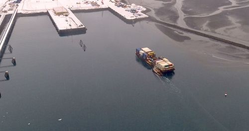 High angle view of ship floating on water