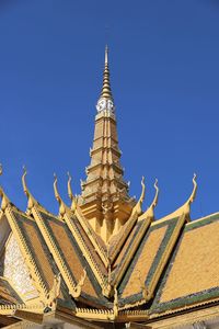 Low angle view of temple against building