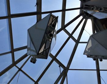 Low angle view of metallic structure against sky