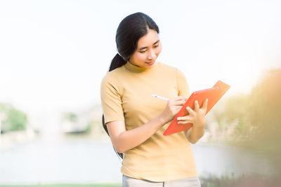 Young woman looking at camera