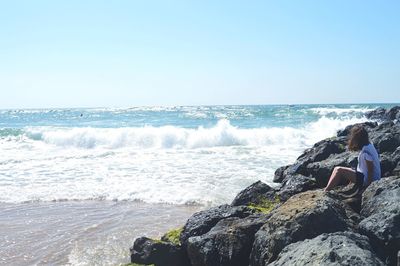 Waves splashing on rocks