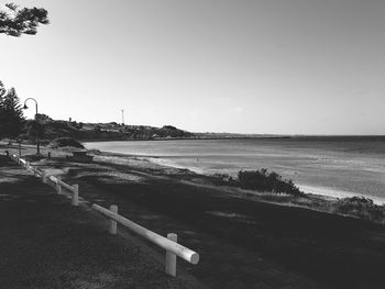 Scenic view of beach against clear sky