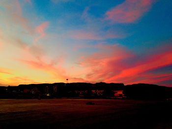 Scenic view of dramatic sky during sunset