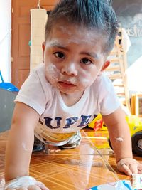 Portrait of cute little baby at home