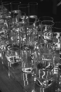 Close-up of wine glasses on table