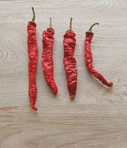 High angle view of red chili peppers on table