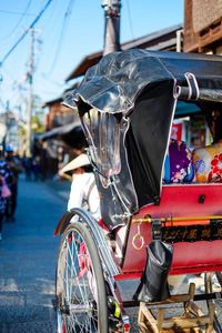 Close-up of bicycle on street