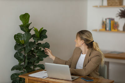 Woman working at home with laptop. home office.  notebook for working. 