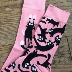 High angle view of human hand on wooden table