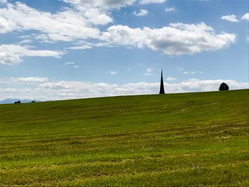 Scenic view of field against sky