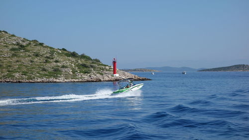 Scenic view of sea against blue sky