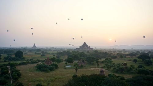 Scenic view of landscape against sky during sunset