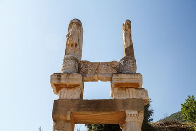 Low angle view of old temple of ephesus against clear sky