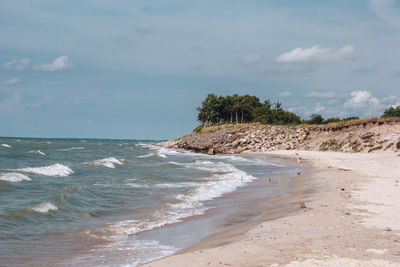 Scenic view of beach against sky