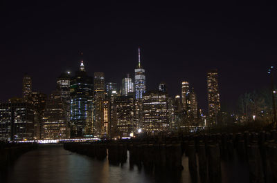 Illuminated city buildings at night