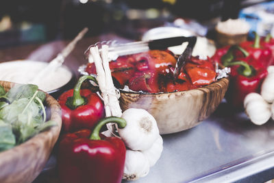Close-up of red chili peppers on table