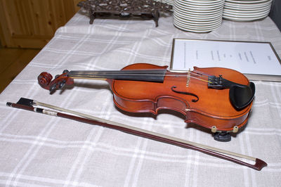 High angle view of piano on table