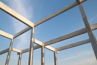 Low angle view of bridge against clear blue sky