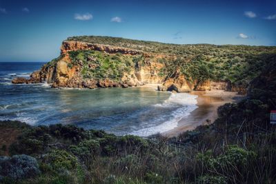 View of calm sea against blue sky