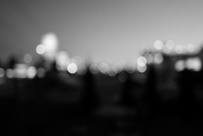 Defocused image of illuminated lights at night