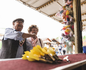 Senior couple having fun on fair