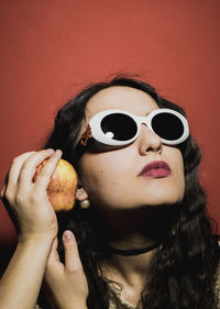 Woman holding apple