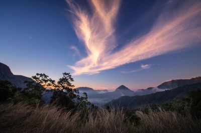 Scenic view of mountains against sky during sunset