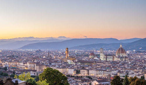 High angle view of townscape against sky during sunset