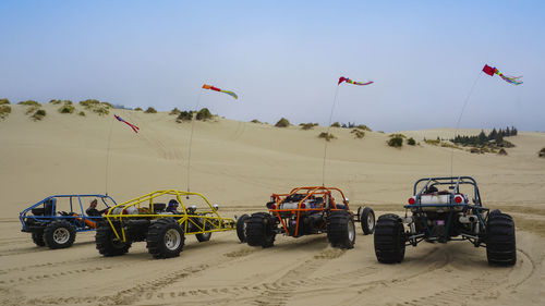 Dune buggy against sky in oregon dunes national park