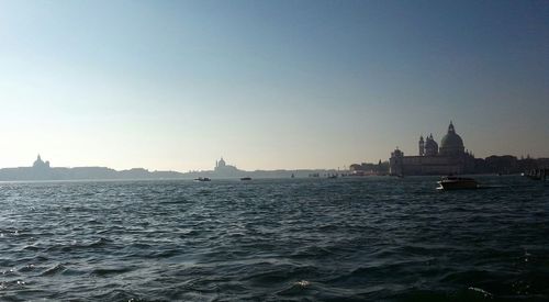 Boats moored in sea