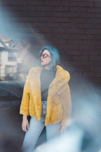 Portrait of young woman in snow