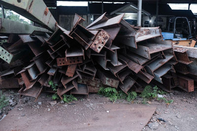 Stack of old iron on field