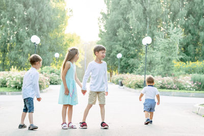 Offended child. the large family. brothers and sisters. walk children in the park. 