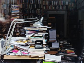 Stack of books on table at home