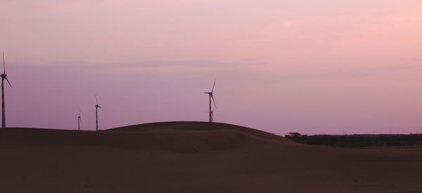 Scenic view of landscape against sky during sunset