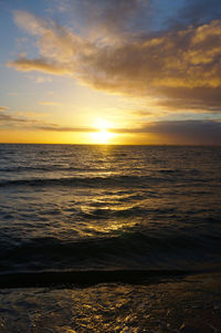 Scenic view of sea against sky during sunset