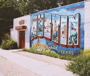 Graffiti on wall by street