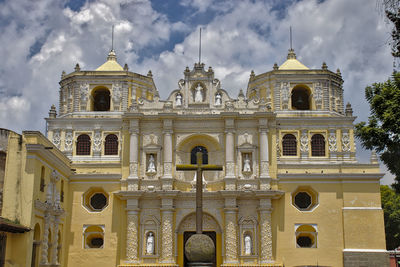 Facade of historic building against sky