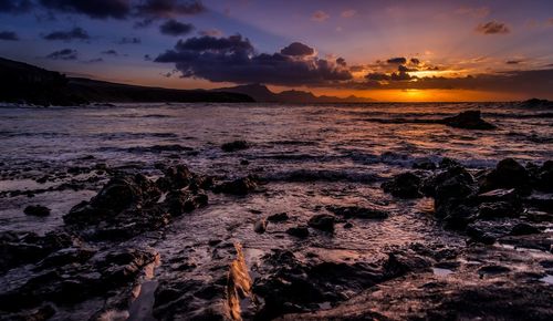 Scenic view of sea against sky during sunset