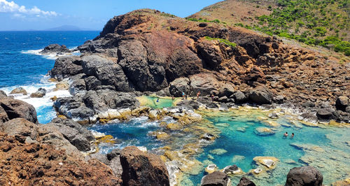 Scenic view of natural pools at the beach