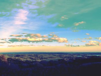 Scenic view of landscape against sky during sunset