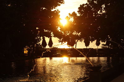 Close-up of water against sky at sunset