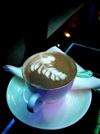 Close-up of cappuccino on table